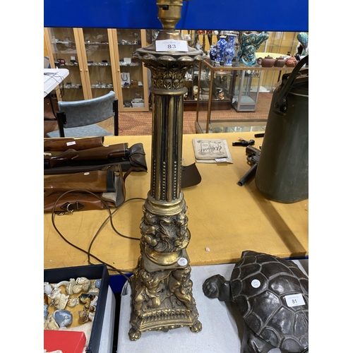 83 - A VINTAGE  GILT METAL CHERUB DESIGN LAMP BASE, HEIGHT 63CM INCLUDING FITTING