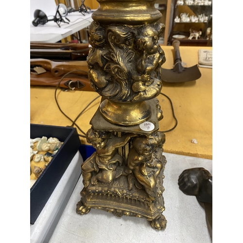 83 - A VINTAGE  GILT METAL CHERUB DESIGN LAMP BASE, HEIGHT 63CM INCLUDING FITTING