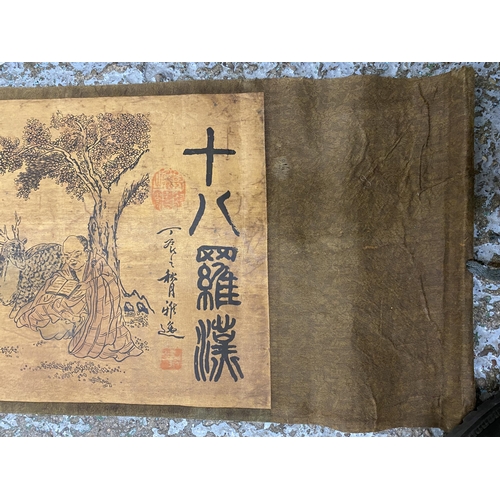 411 - A LARGE 19TH CENTURY JAPANESE TAPESTRY SCROLL, LENGTH 370CM