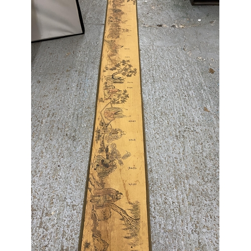 411 - A LARGE 19TH CENTURY JAPANESE TAPESTRY SCROLL, LENGTH 370CM