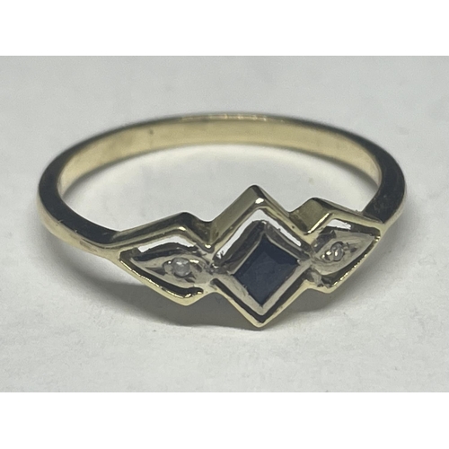 517 - A TESTED TO 14 CARAT GOLD RING WITH A DECO STYLE CENTRE SAPPHIRE AND A DIAMOND EACH SIDE SIZE N GROS... 