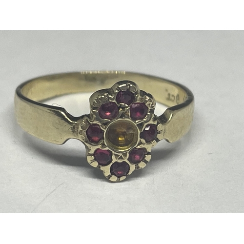519 - A 9 CARAT GOLD RING WITH WITH EIGHT RED STONES (CENTRE STONE MISSING) SIZE K GROSS WEIGHT 1.58 GRAMS