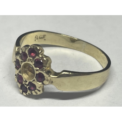 519 - A 9 CARAT GOLD RING WITH WITH EIGHT RED STONES (CENTRE STONE MISSING) SIZE K GROSS WEIGHT 1.58 GRAMS