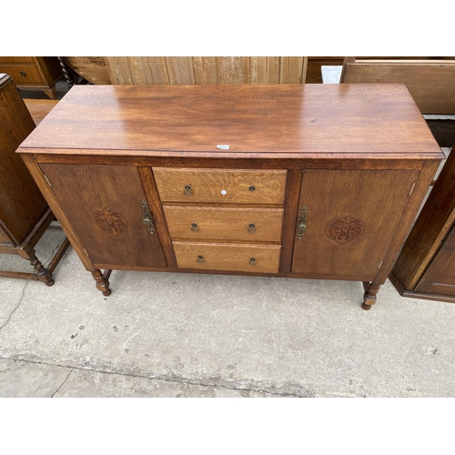 2697 - A MID 20TH CENTURY OAK SIDEBOARD 54