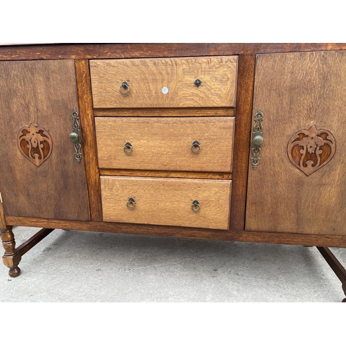 2697 - A MID 20TH CENTURY OAK SIDEBOARD 54