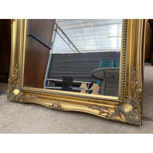 2699 - A MODERN OAK FRAMED WALL MIRROR 36