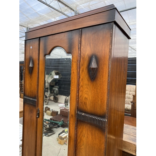 2700 - A MID 20TH CENTURY OAK MIRROR DOOR WARDROBE 35