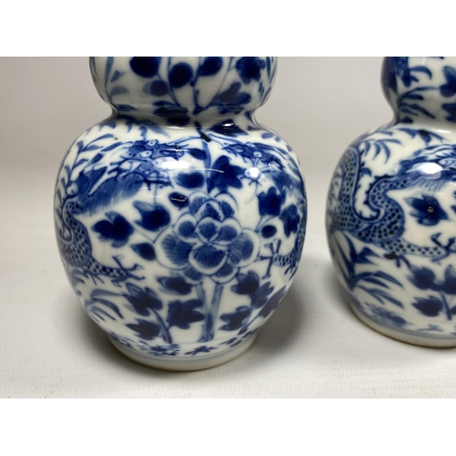 301A - A PAIR OF QING 19TH CENTURY CHINESE BLUE AND WHITE KANGXI STYLE DOUBLE GOURD VASES, FOUR CHARACTER M... 