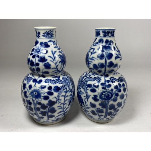 301A - A PAIR OF QING 19TH CENTURY CHINESE BLUE AND WHITE KANGXI STYLE DOUBLE GOURD VASES, FOUR CHARACTER M... 