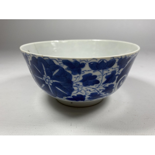 303A - A QING 19TH CENTURY CHINESE BLUE AND WHITE PORCELAIN BOWL WITH LOTUS DESIGN, FOUR CHARACTER MARK TO ... 