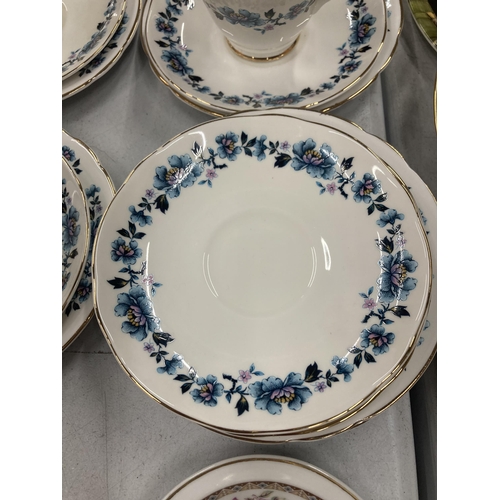 255 - A QUANTITY OF CHINA CUPS AND SAUCERS PLUS A SUGAR BOWL