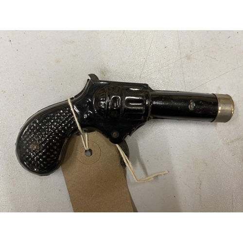 454 - A SMALL BLACK PAINTED TOY PISTOL, TOTAL LENGTH 12CM