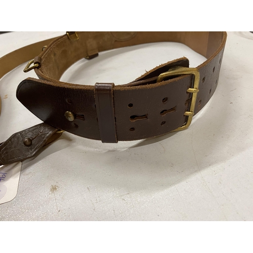 467 - A LEATHER SAM BROWNE BELT AND SHOULDER STRAP