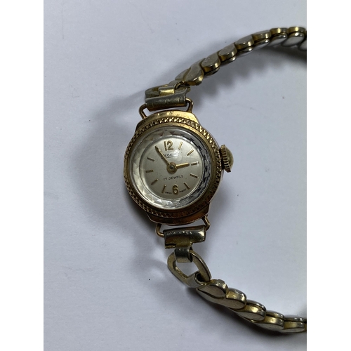 512 - A VINTAGE 9CT YELLOW GOLD CASED 'REGENCY' 17 JEWELS LADIES WATCH