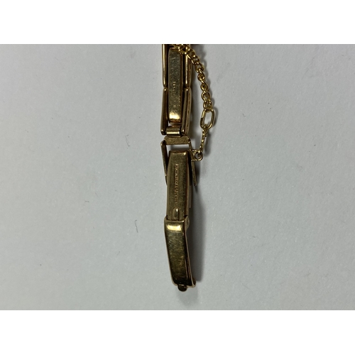 531A - A VINTAGE GLADSTONE 9CT YELLOW GOLD CASED & STRAP LADIES WATCH