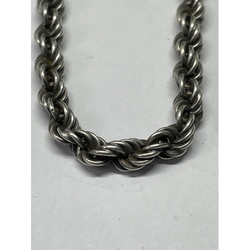 549 - A MARKED SILVER ROPE NECKLACE LENGTH 18 INCHES