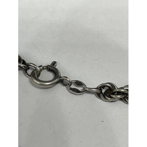 549 - A MARKED SILVER ROPE NECKLACE LENGTH 18 INCHES