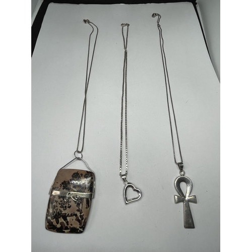 551 - THREE SILVER NECKLACES WITH PENDANTS