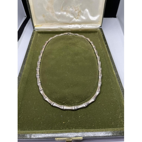 559 - A SILVER  BAMBOO DESIGN NECKLACE IN A PRESENTATION BOX