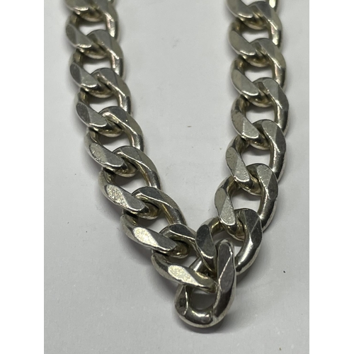 563 - A MARKED SILVER NECKLACE LENGTH 18 INCHES