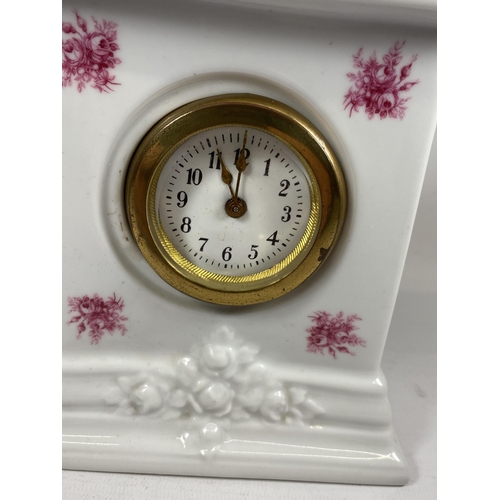 684 - A CONTINENTAL CERAMIC MANTLE CLOCK