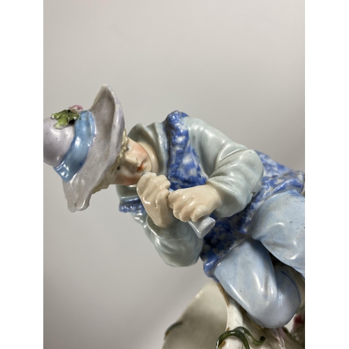 783 - A CONTINENTAL PORCELAIN FIGURE OF A FLUTE PLAYER, BLUE SIGNED MARK TO BASE