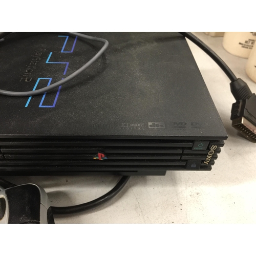 1038 - A SONY PLAYSTATION 2 WITH MICROSOFT MOUSE