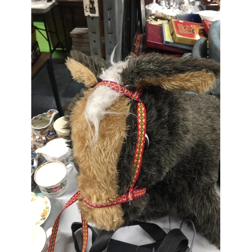 1039 - A LARGE SOFT TOY DONKEY WITH REINS