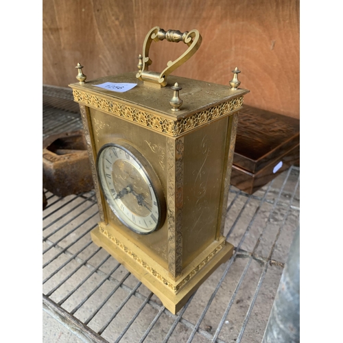 1256 - A VINTAGE GILT MANTLE CLOCK