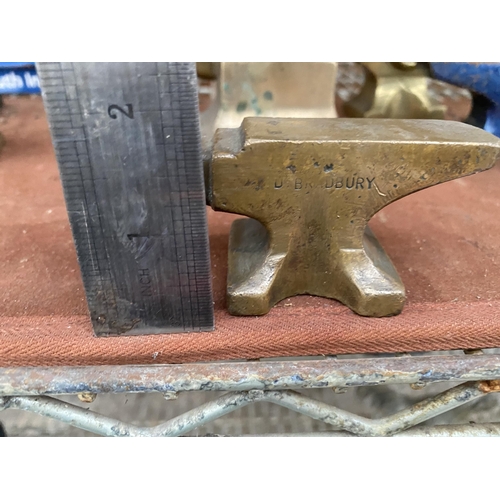 1328 - A MINITURE BRASS SAMPLE ANVIL STAMPED D. BRADBURY