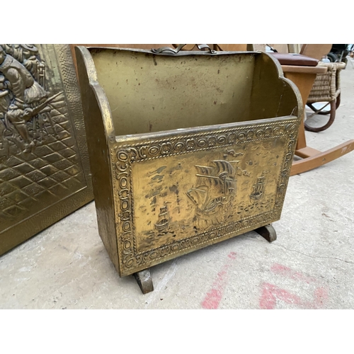 1360 - A BRASS EMBOSED MAGAZINE RACK AND A FURTHER BRASS EMBOSSED FIRE SCREEN