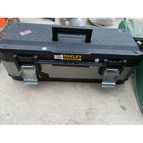 1404 - A STANLEY PLASTIC TOOL BOX AND AN ASSORTMENT OF TOOLS TO INCLUDE AN ADJUSTABLE SPANNER AND SCREW DRI... 