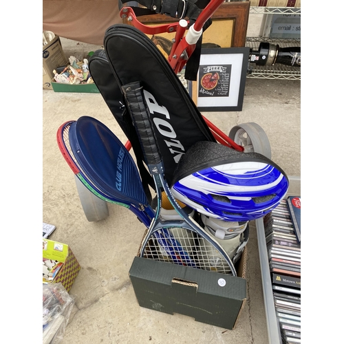 1540 - AN ASSORTMENT OF SPORTS RACKETS AND A GOLF TROLLEY ETC