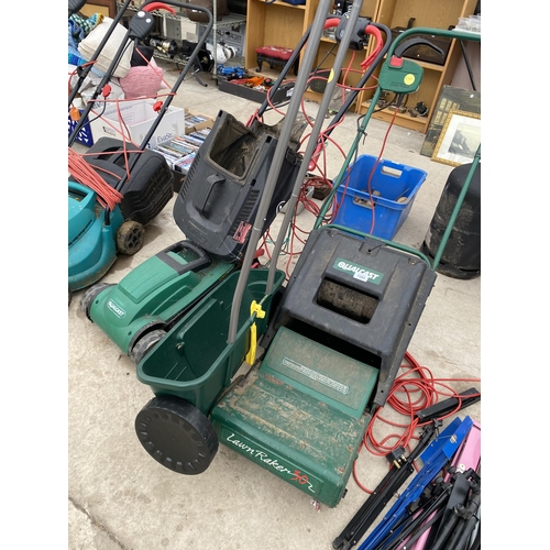 1564 - AN ELECTRIC QUALCAST LAWN MOWER, A LAWN RAKE AND A GARDEN SEEDER