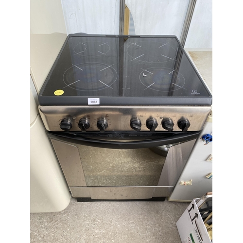 2063 - A SILVER AND BLACK INDESIT ELECTRIC OVEN AND HOB