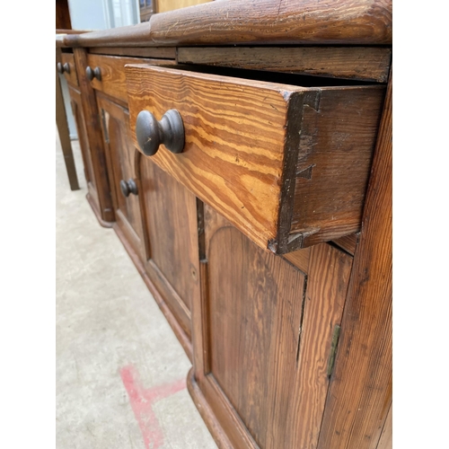 2318 - A VCITORIAN PINE BREAKFRONT KITCHEN DRESSER ENCLOSING FOUR ARCHED PANEL DOORS AND THREE DRAWERS, 75