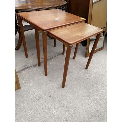 2406 - A NEST OF TWO RETRO TEAK TABLES AND WALL MIRROR