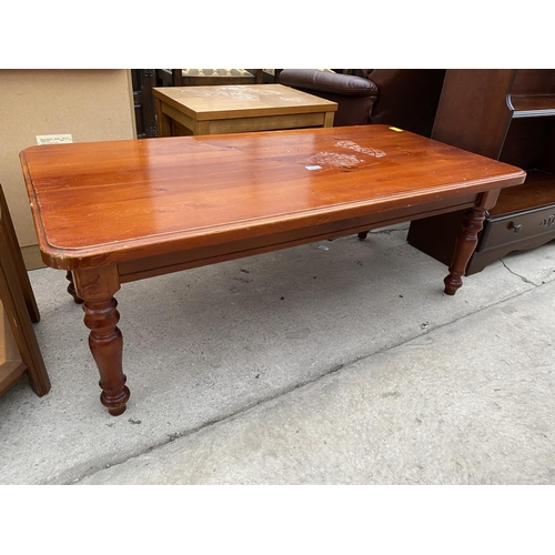 2420 - A MODERN PINE COFFEE TABLE ON TURNED LEGS, 47X23