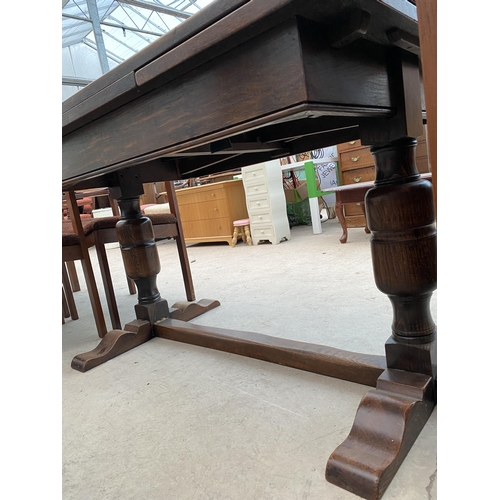 2437 - AN OAK REFECTORY STYLE DRAW-LEAF DINING TABLE ON TWO TURNED COLUMNS, 48X30