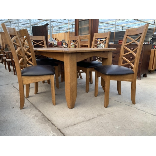 2465 - A MODERN OAK EXTENDING DINING TABLE, 70X38