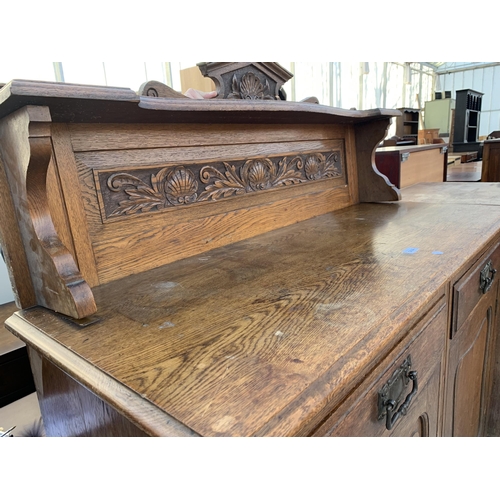 2484 - AN OAK ART NOUVEAU INFLUENCE SIDEBOARD WITH RAISED BACK, TWO DRAWERS AND TWO CUPBOARDS, 47