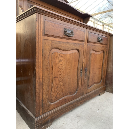 2484 - AN OAK ART NOUVEAU INFLUENCE SIDEBOARD WITH RAISED BACK, TWO DRAWERS AND TWO CUPBOARDS, 47