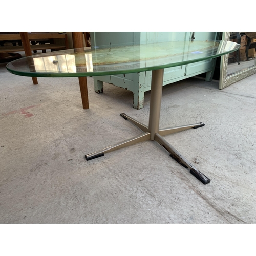 2489 - A RETRO 1970'S OVAL GLASS COFFEE TABLE, 38X17