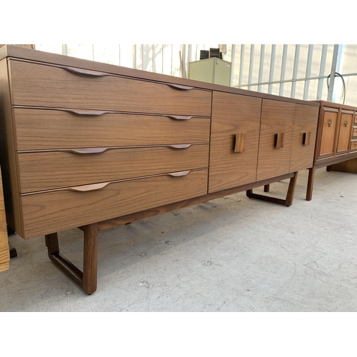 2497 - A RETRO TEAK 'EUROPA FURNITURE' SIDEBOARD ENCLOSING THREE CUPBOARDS, ONE WITH DROP-DOWN FRONT AND FO... 