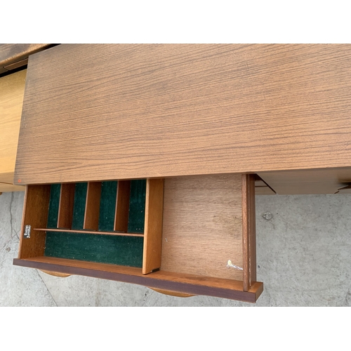 2497 - A RETRO TEAK 'EUROPA FURNITURE' SIDEBOARD ENCLOSING THREE CUPBOARDS, ONE WITH DROP-DOWN FRONT AND FO... 