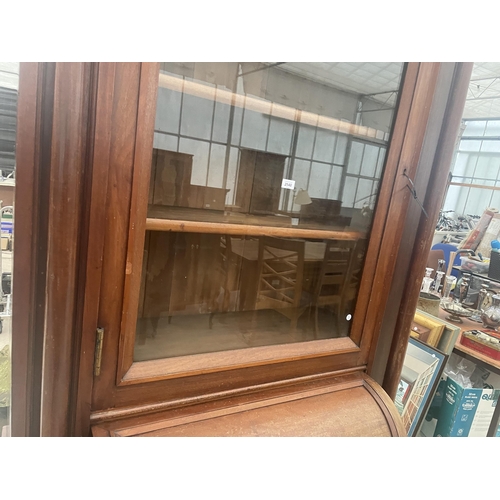 2548 - A VICTORIAN MAHOGANY CYLINDER BUREAU BOOKCASE WITH SINGLE ARCHED GLAZED UPPER PORTION, THE BASE ENCL... 