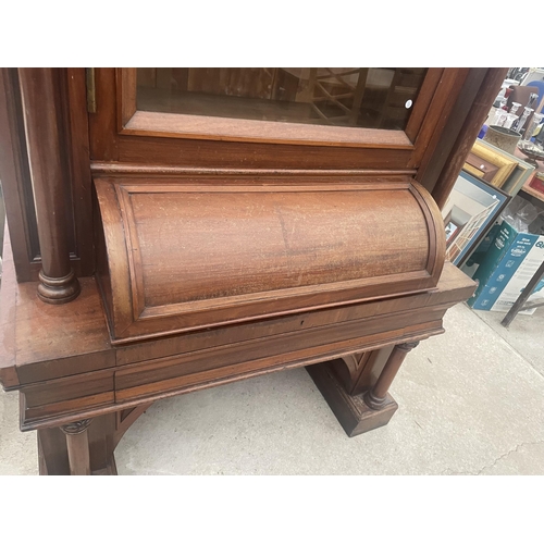 2548 - A VICTORIAN MAHOGANY CYLINDER BUREAU BOOKCASE WITH SINGLE ARCHED GLAZED UPPER PORTION, THE BASE ENCL... 