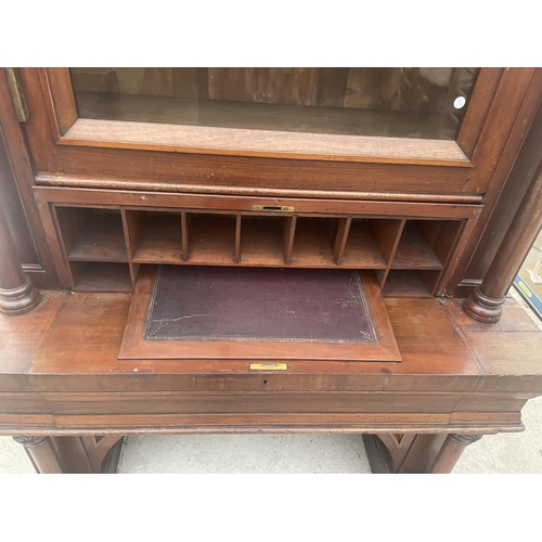 2548 - A VICTORIAN MAHOGANY CYLINDER BUREAU BOOKCASE WITH SINGLE ARCHED GLAZED UPPER PORTION, THE BASE ENCL... 