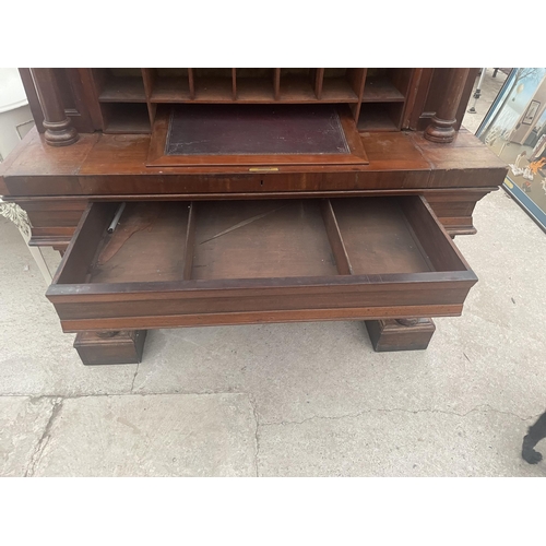 2548 - A VICTORIAN MAHOGANY CYLINDER BUREAU BOOKCASE WITH SINGLE ARCHED GLAZED UPPER PORTION, THE BASE ENCL... 