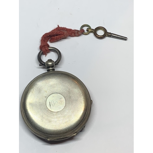 561 - A .900 GRADE SILVER OPEN FACED POCKET WATCH WITH KEY